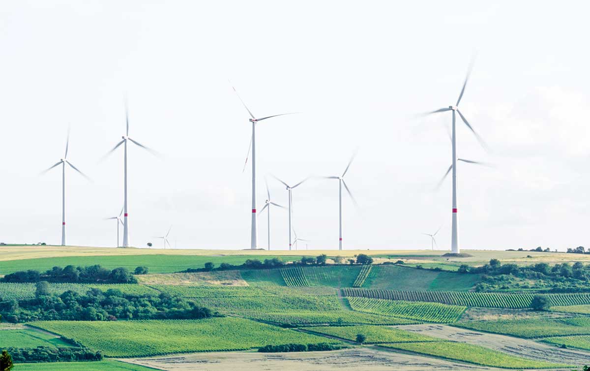 Wind farm on green hills.